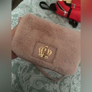 Juicy Couture pinky furry purse!